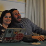 Images of two people smiling at their computers