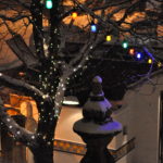 Image of lit up tree on snowy night