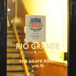 Image of Rio Grande Restaurant door with trivia bowl sign