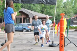 Image of contestants running