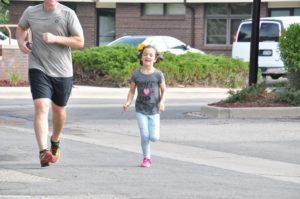 Image of little girl running