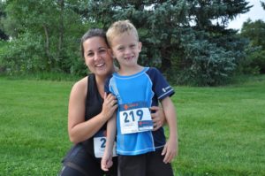 Image of mom and son smiling