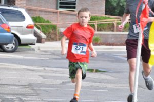 Image little boy running