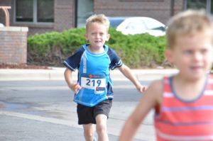 Image of young boys running