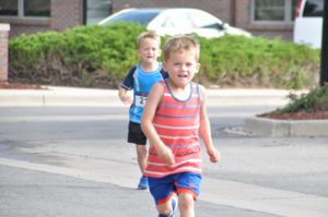Image of two boys running