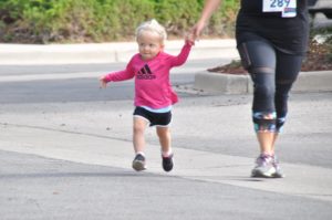 Image of little girl running