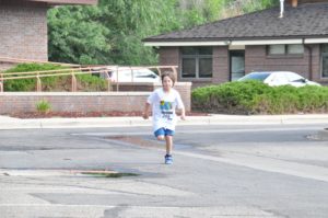Image of little boy running